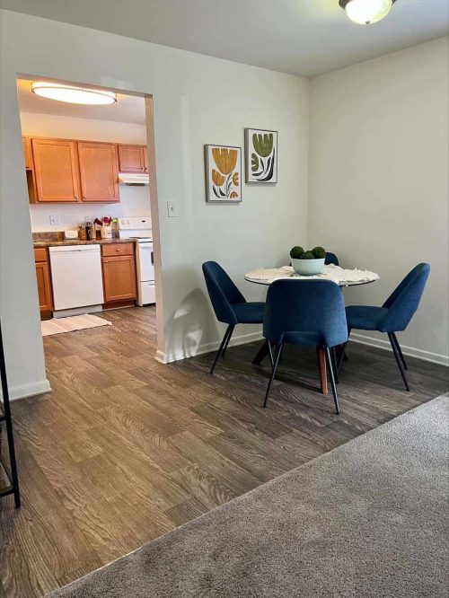 Room With Dining Area & Kitchen In Background